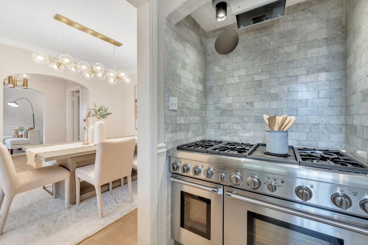 Dining room, Interior, Kitchen, Pendant Lights, Stainless Steel Appliances, Stone Walls, Wood Texture Flooring