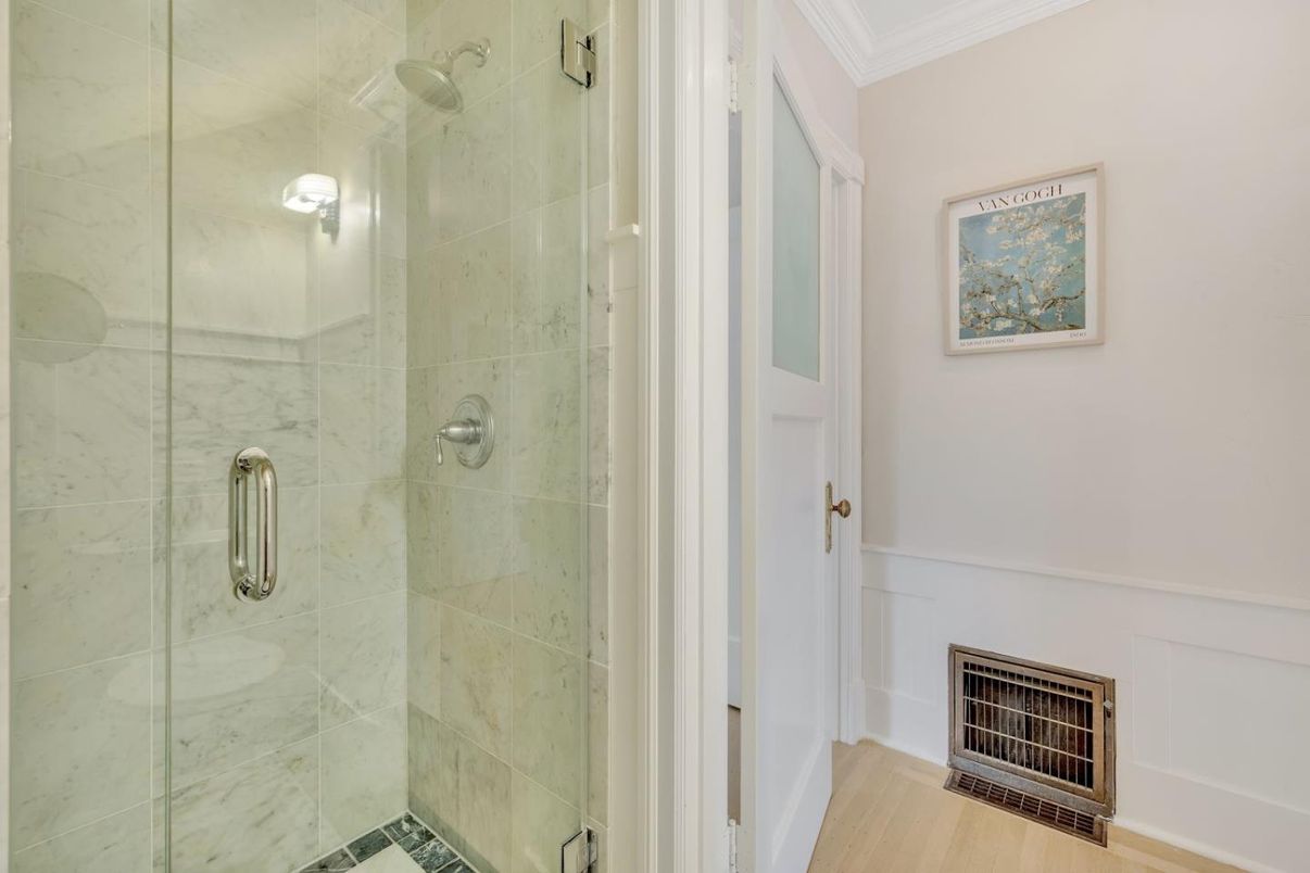 Bathroom, Fireplace, Glass Shower, Interior, Marble Walls, Wood Texture Flooring