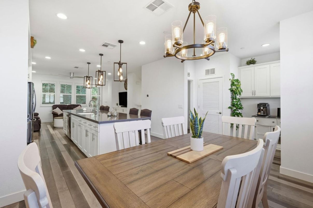 Chandelier, Dining room, Interior, Kitchen, Living room, Pendant Lights, Recessed Lighting, Wood Texture Flooring