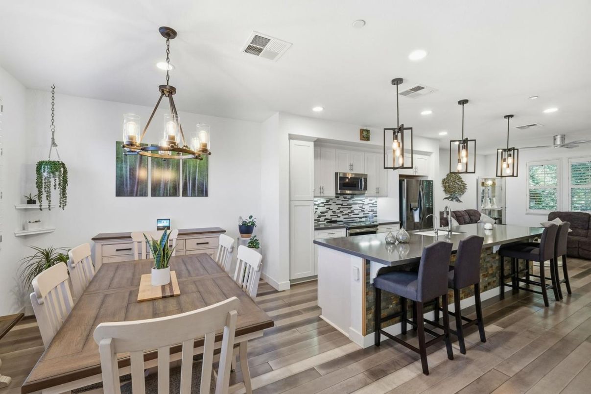 Dining room, Interior, Kitchen, Pendant Lights, Recessed Lighting, Stainless Steel Appliances, Wood Texture Flooring