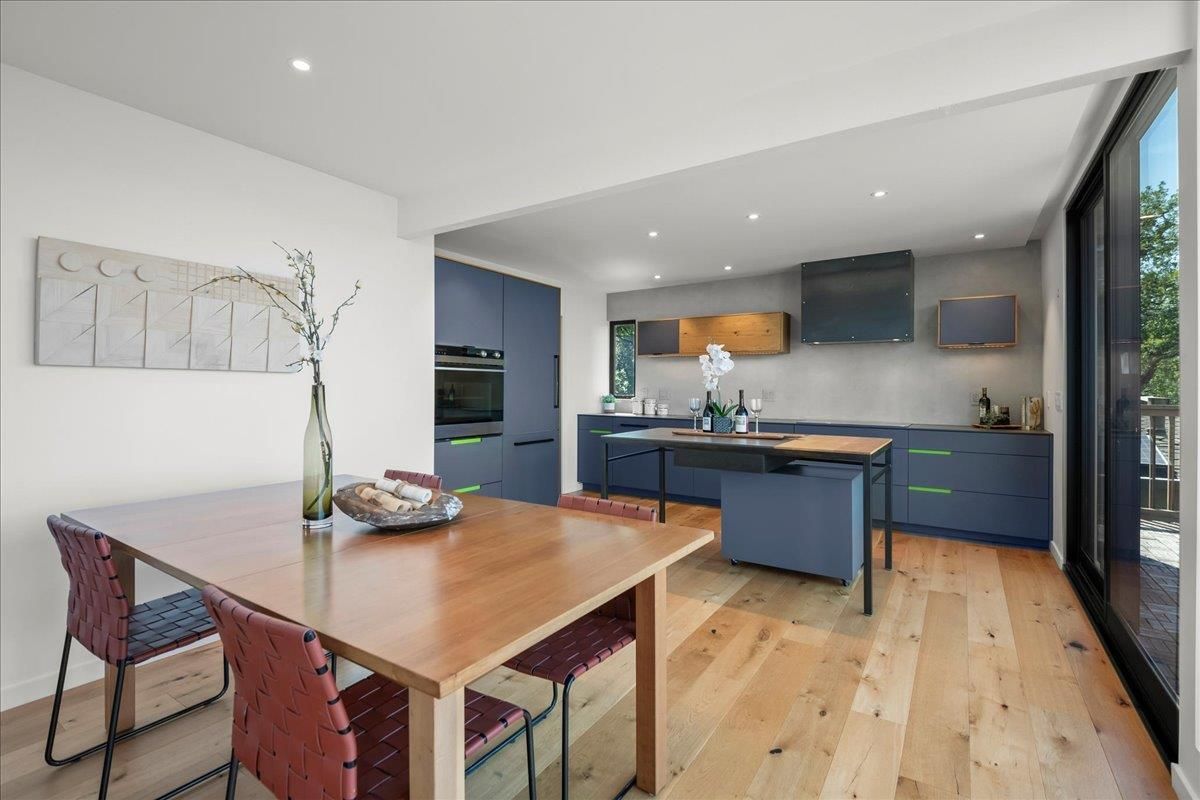 Dining room, Interior, Kitchen, Recessed Lighting, Stainless Steel Appliances, Wood Texture Flooring