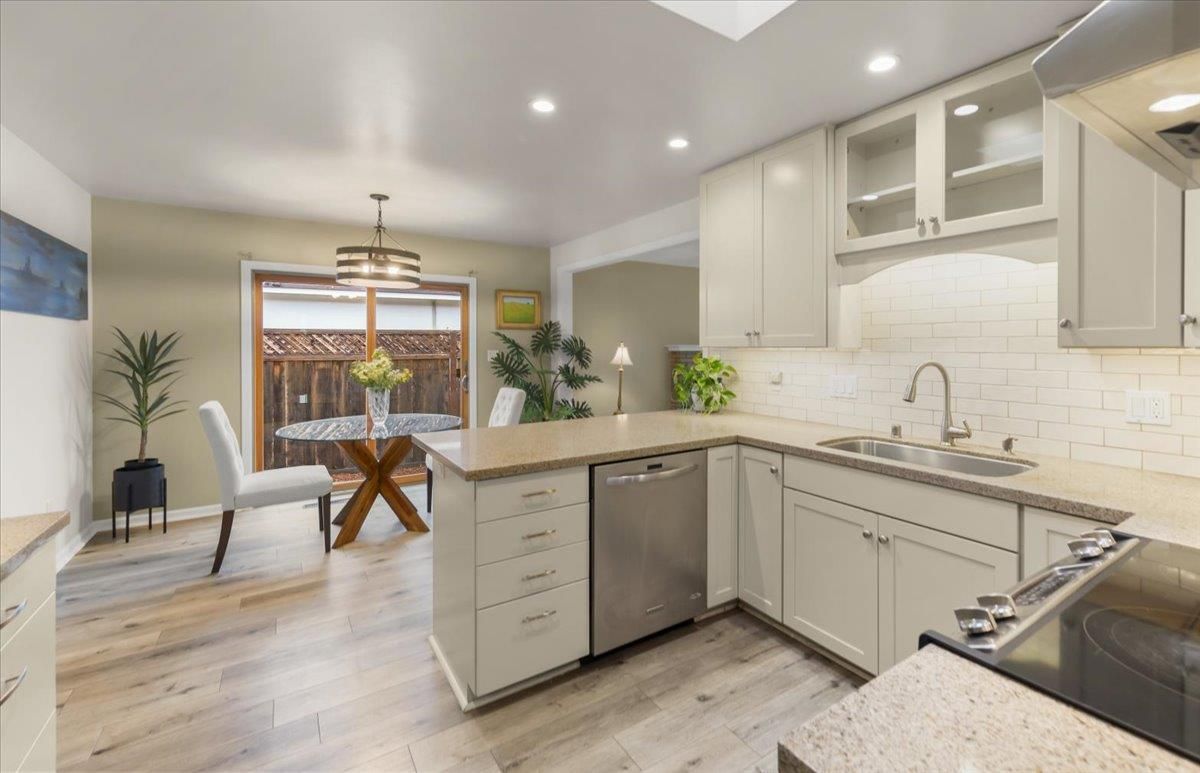Dining room, Interior, Kitchen, Pendant Lights, Recessed Lighting, Stainless Steel Appliances, Wood Texture Flooring