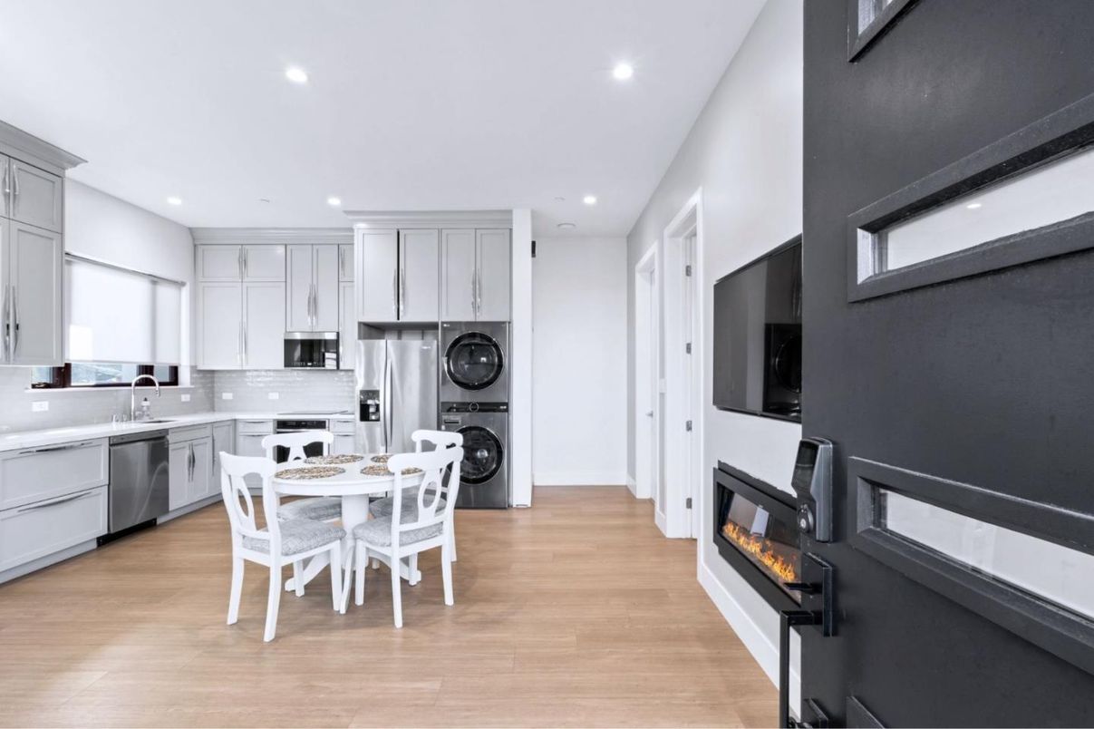 Dining room, Fireplace, Interior, Kitchen, Recessed Lighting, Stainless Steel Appliances, Wood Texture Flooring