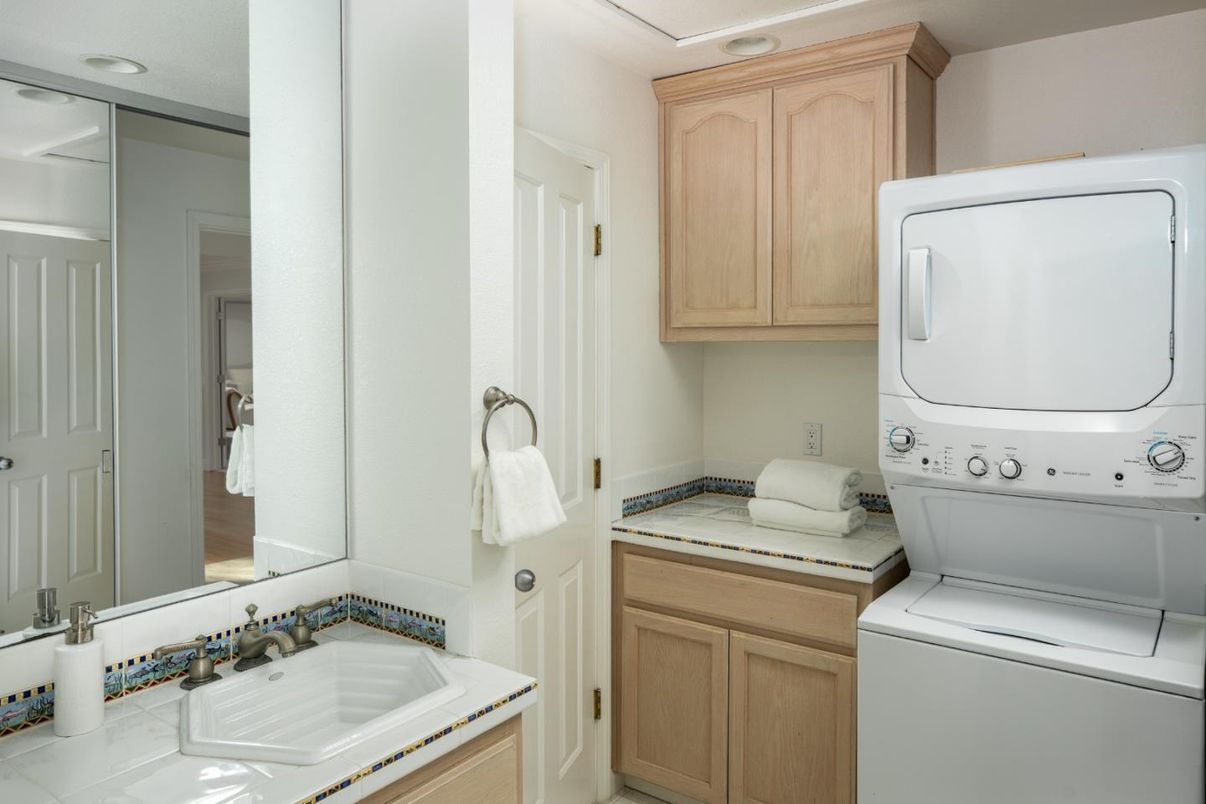 Bathroom, Interior, Recessed Lighting, Tile Countertops, Utility Closets, Washer