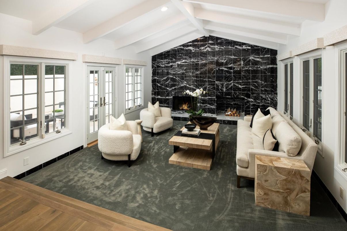 Fireplace, Interior, Living room, Marble Walls, Recessed Lighting, Wood Texture Flooring