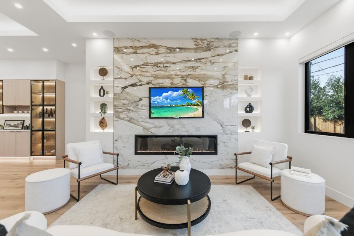 Fireplace, Interior, Living room, Marble Walls, Recessed Lighting, Wood Texture Flooring