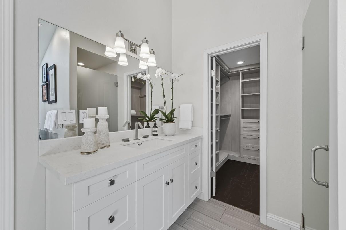 Bathroom, Dual Sink Vanities, Interior, Recessed Lighting, Walk-in Closets, Wood Texture Flooring
