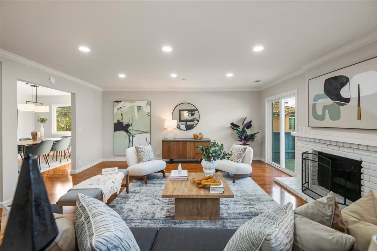 Dining room, Fireplace, Interior, Living room, Recessed Lighting, Wood Texture Flooring