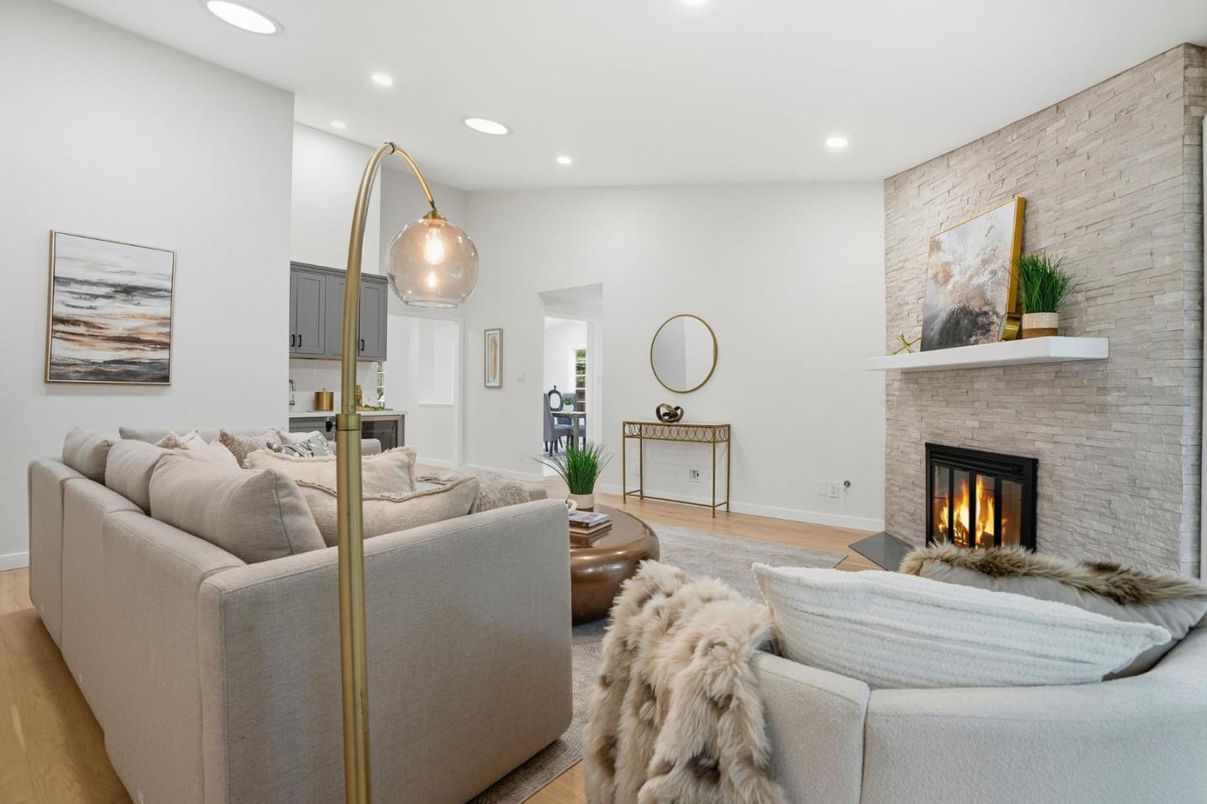 Fireplace, Interior, Living room, Recessed Lighting, Stone Walls, Wood Texture Flooring