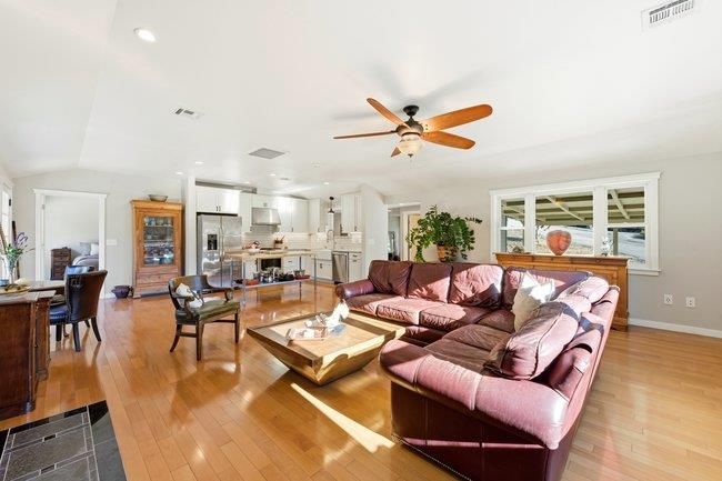 Dining room, Interior, Kitchen, Living room, Recessed Lighting, Stainless Steel Appliances, Wood Texture Flooring