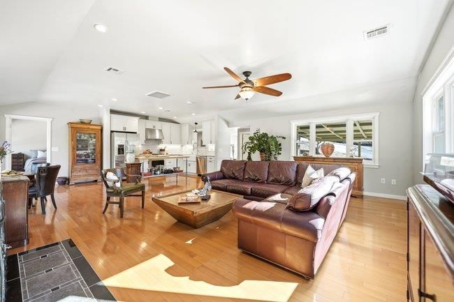 Dining room, Interior, Kitchen, Living room, Recessed Lighting, Stainless Steel Appliances, Wood Texture Flooring
