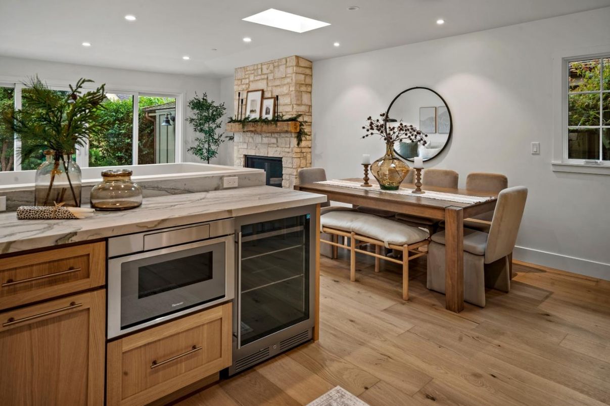 Dining room, Fireplace, Interior, Kitchen, Recessed Lighting, Stone Walls, Wood Texture Flooring