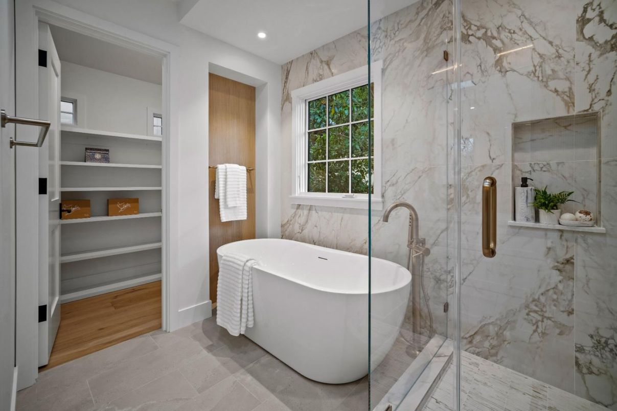 Bathroom, Free Standing Baths, Glass Shower, Interior, Marble Walls, Recessed Lighting, Wood Texture Flooring