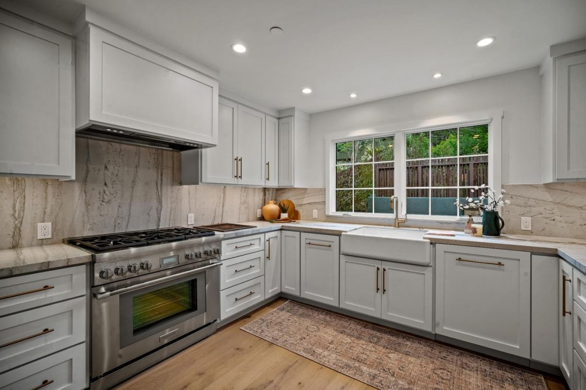 Interior, Kitchen, Marble Walls, Recessed Lighting, Stainless Steel Appliances, Wood Texture Flooring