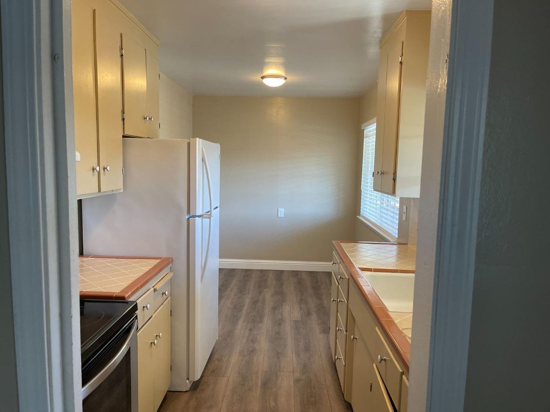 Interior, Kitchen, Tile Countertops, Wood Texture Flooring