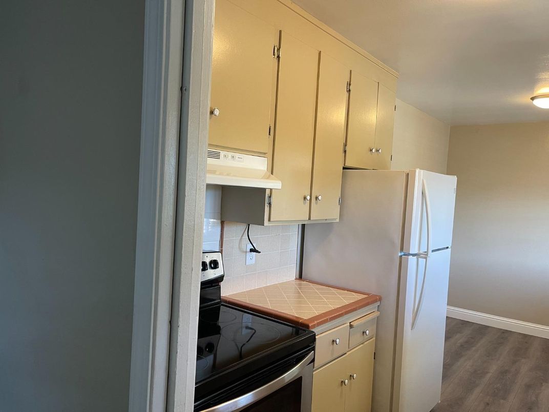 Interior, Kitchen, Tile Countertops, Wood Texture Flooring