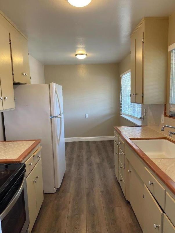 Interior, Kitchen, Tile Countertops, Wood Texture Flooring