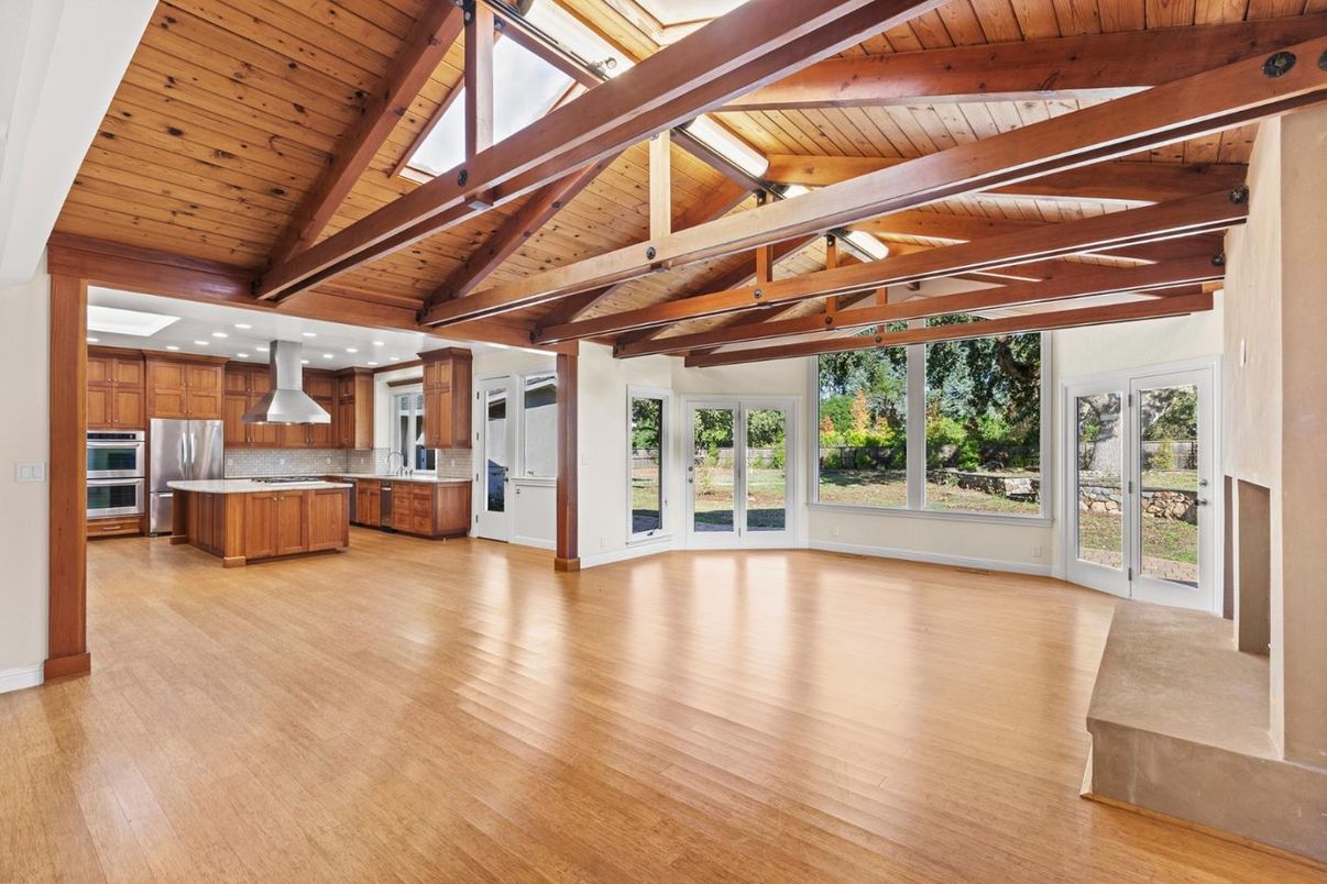 Empty room, Interior, Kitchen, Recessed Lighting, Stainless Steel Appliances, Wooden Beams, Wooden Ceilings, Wood Texture Flooring