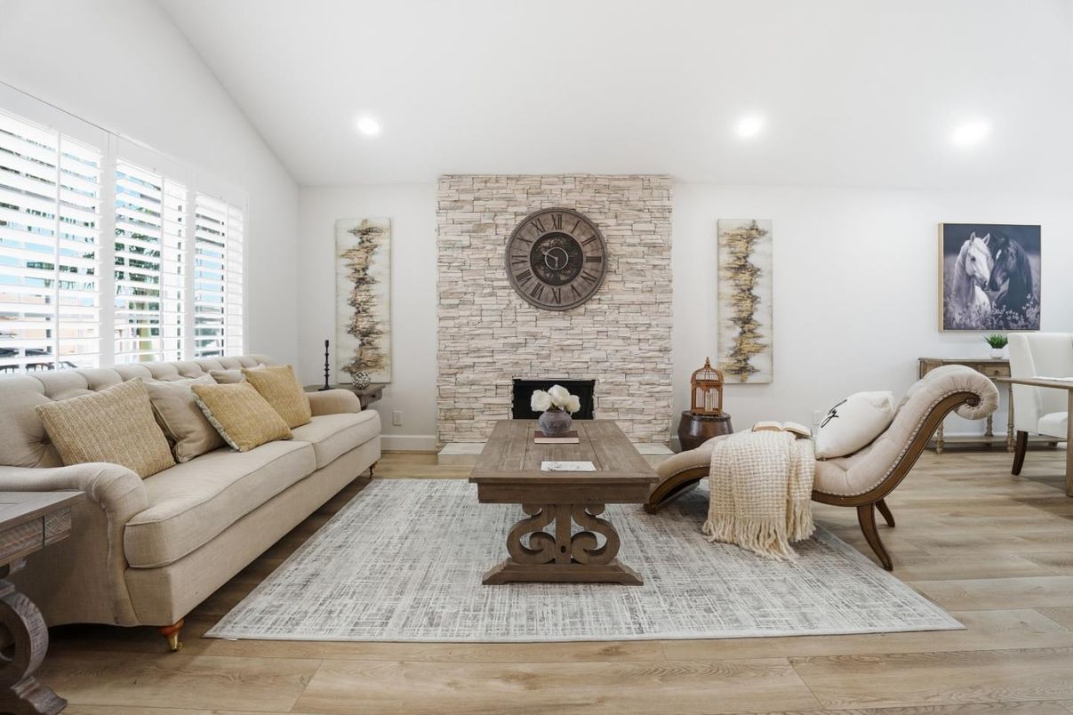 Fireplace, Interior, Living room, Recessed Lighting, Stone Walls, Wood Texture Flooring