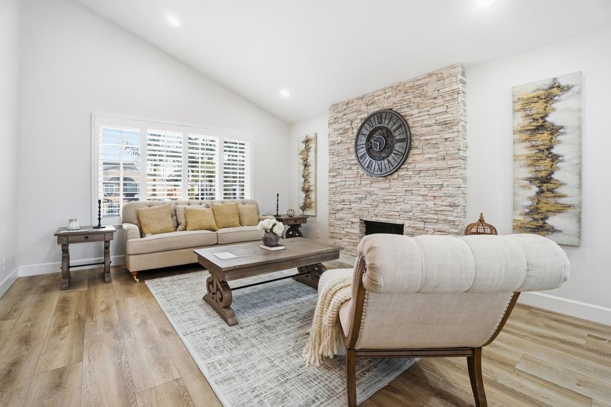 Fireplace, Interior, Living room, Recessed Lighting, Stone Walls, Wood Texture Flooring