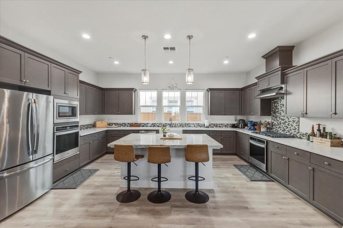 Interior, Kitchen, Pendant Lights, Recessed Lighting, Stainless Steel Appliances, Wood Texture Flooring