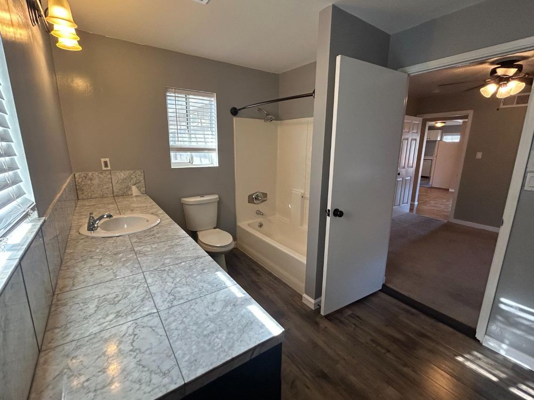 Bathroom, Dual Sink Vanities, Interior, Tile Countertops, Wood Texture Flooring