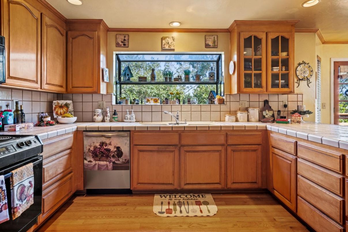 Interior, Kitchen, Recessed Lighting, Tile Countertops, Wood Texture Flooring