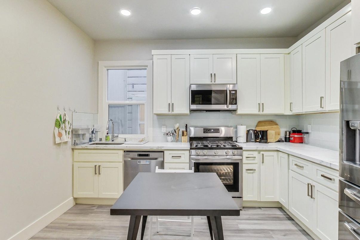 Interior, Kitchen, Recessed Lighting, Stainless Steel Appliances, Wood Texture Flooring