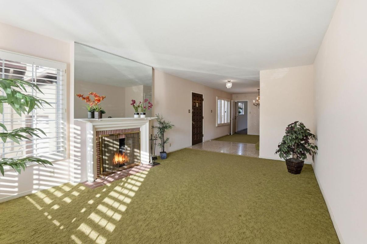 Chandelier, Empty room, Fireplace, Interior