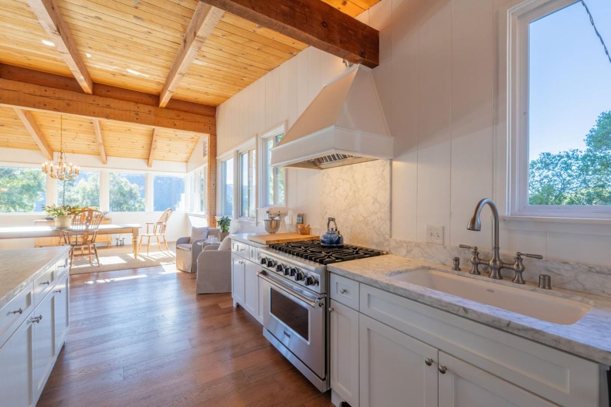 Chandelier, Dining room, Interior, Kitchen, Living room, Recessed Lighting, Stainless Steel Appliances, Wooden Beams, Wooden Ceilings, Wood Texture Flooring