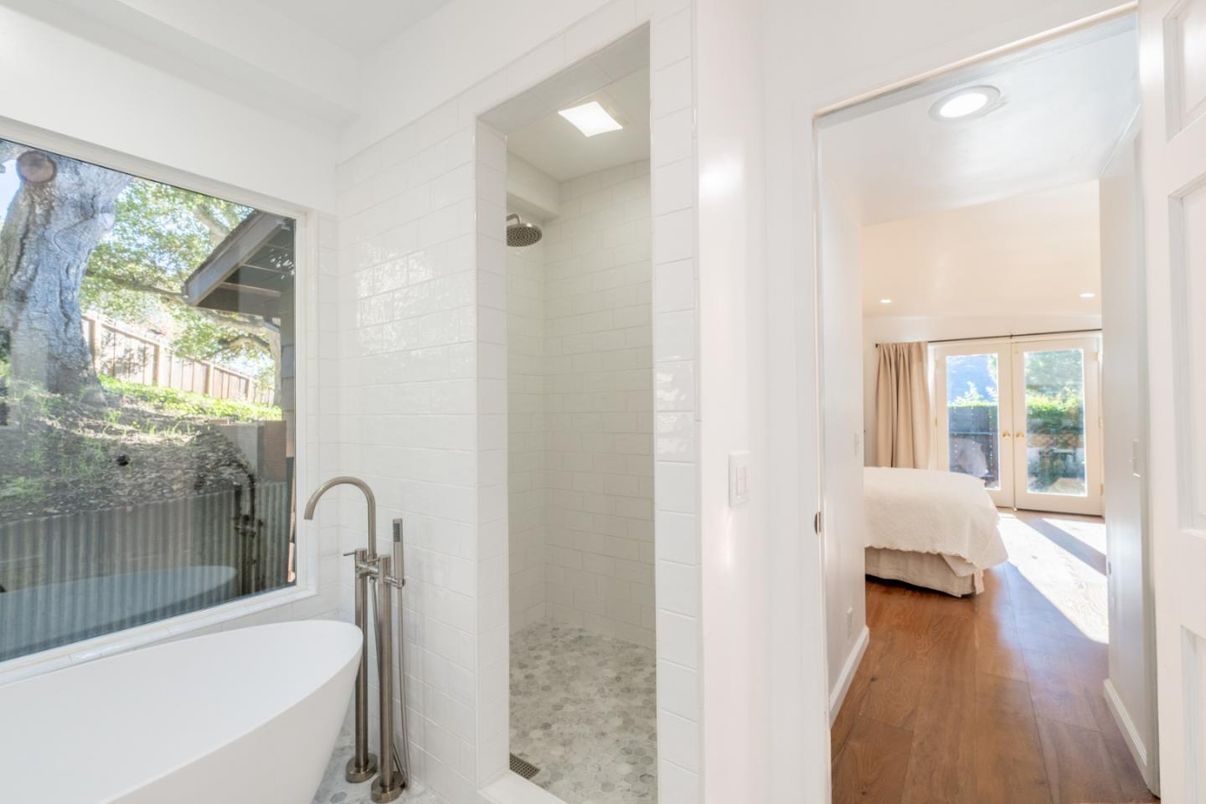 Bathroom, Free Standing Baths, Glass Shower, Interior, Recessed Lighting, Wood Texture Flooring