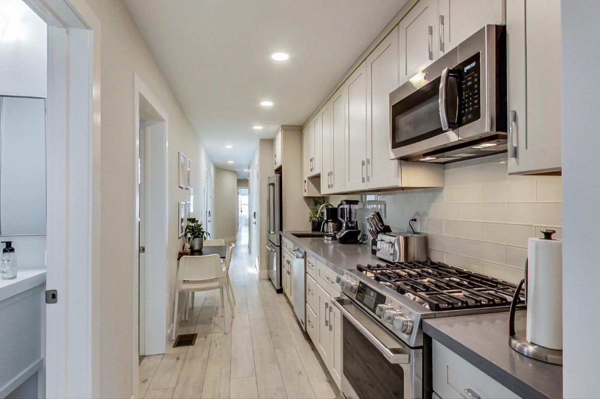 Interior, Kitchen, Recessed Lighting, Stainless Steel Appliances, Wood Texture Flooring