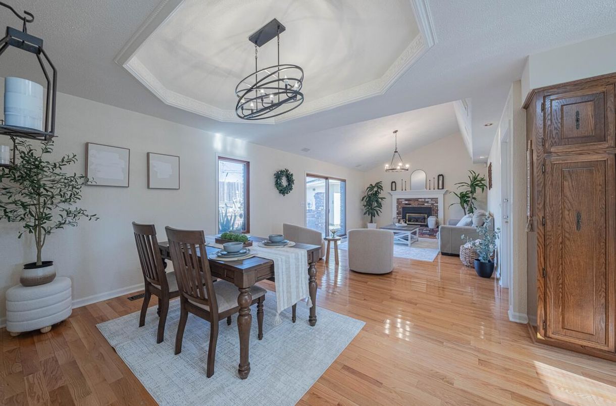 Chandelier, Dining room, Fireplace, Interior, Living room, Pendant Lights, Wood Texture Flooring