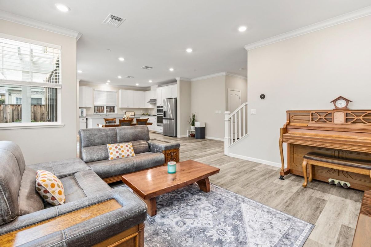 Interior, Kitchen, Living room, Piano, Recessed Lighting, Stainless Steel Appliances, Wood Texture Flooring