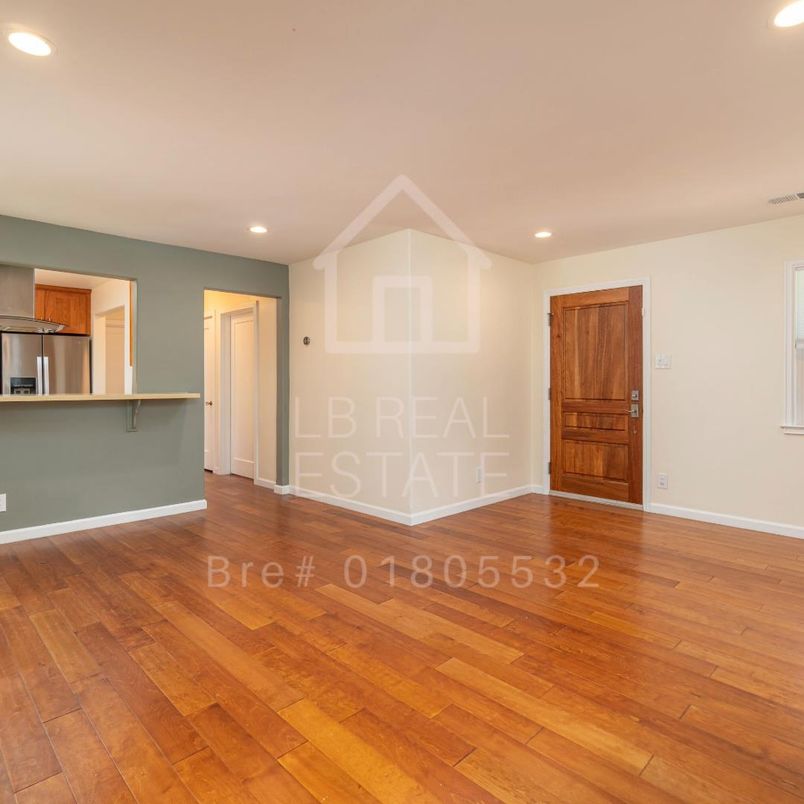 Empty room, Interior, Kitchen, Recessed Lighting, Stainless Steel Appliances, Wood Texture Flooring
