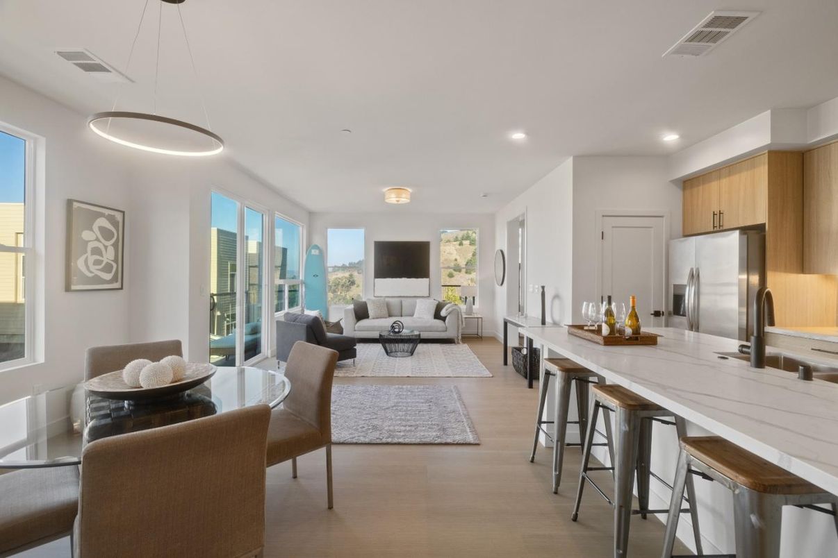 Dining room, Interior, Kitchen, Living room, Pendant Lights, Recessed Lighting, Stainless Steel Appliances, Wood Texture Flooring