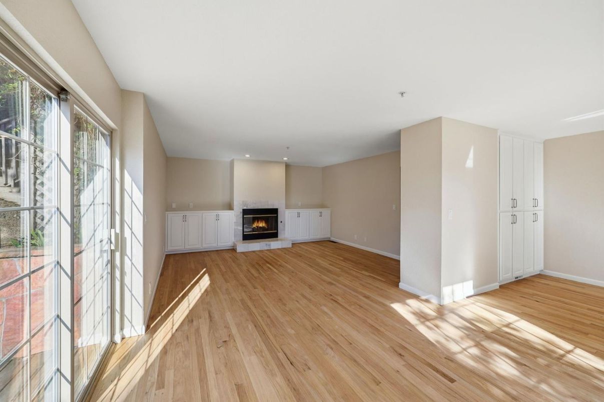Empty room, Fireplace, Interior, Recessed Lighting, Wood Texture Flooring