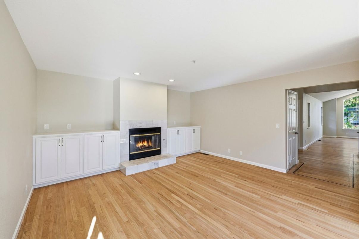 Empty room, Fireplace, Interior, Recessed Lighting, Wood Texture Flooring