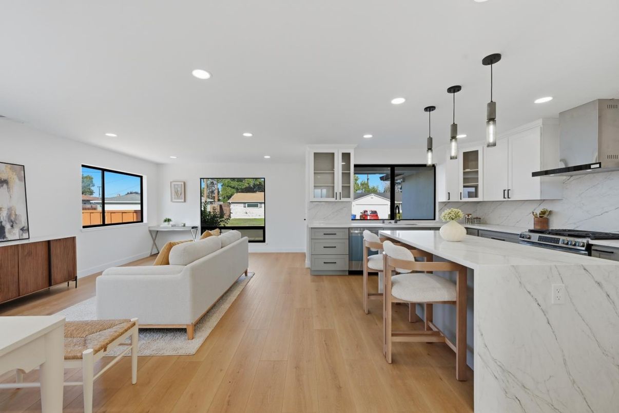 Interior, Kitchen, Living room, Marble Walls, Pendant Lights, Recessed Lighting, Stainless Steel Appliances, Wood Texture Flooring