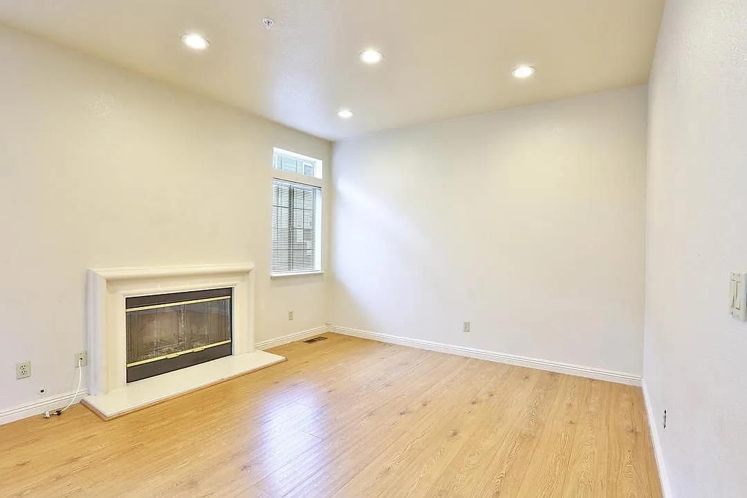 Empty room, Fireplace, Interior, Recessed Lighting, Wood Texture Flooring