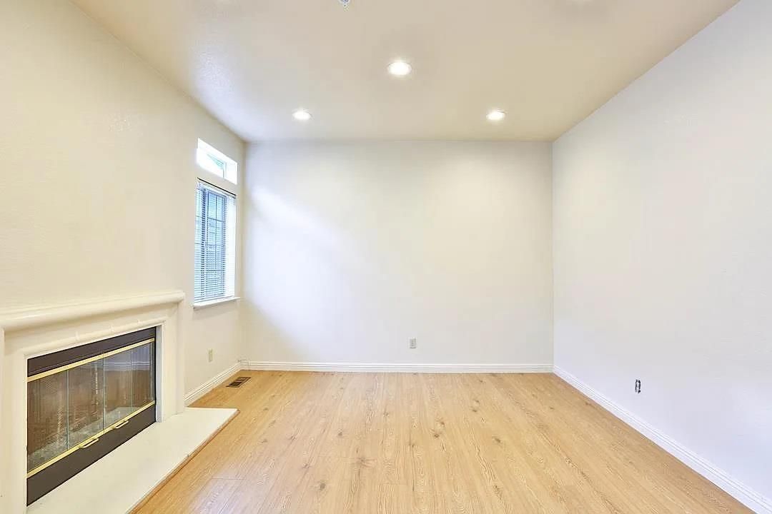 Empty room, Fireplace, Interior, Recessed Lighting, Wood Texture Flooring
