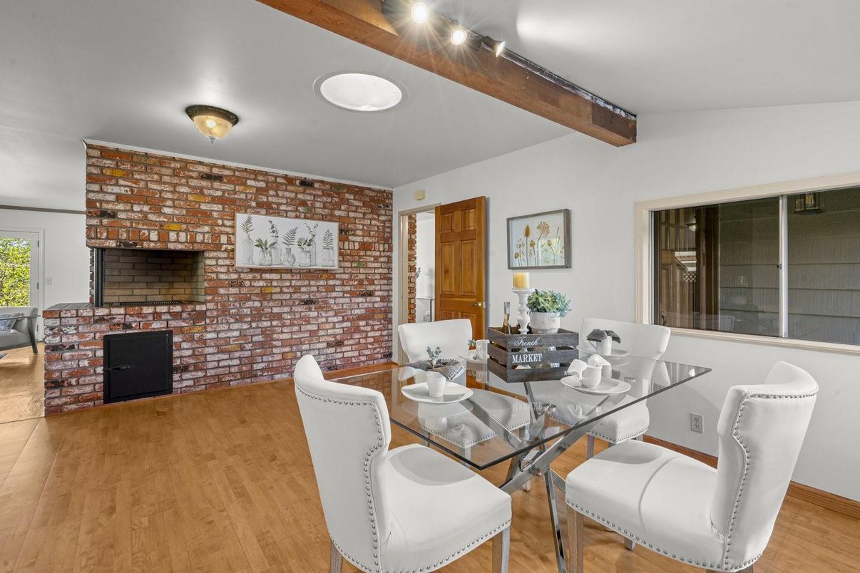Dining room, Fireplace, Interior, Stone Walls, Wooden Beams, Wood Texture Flooring