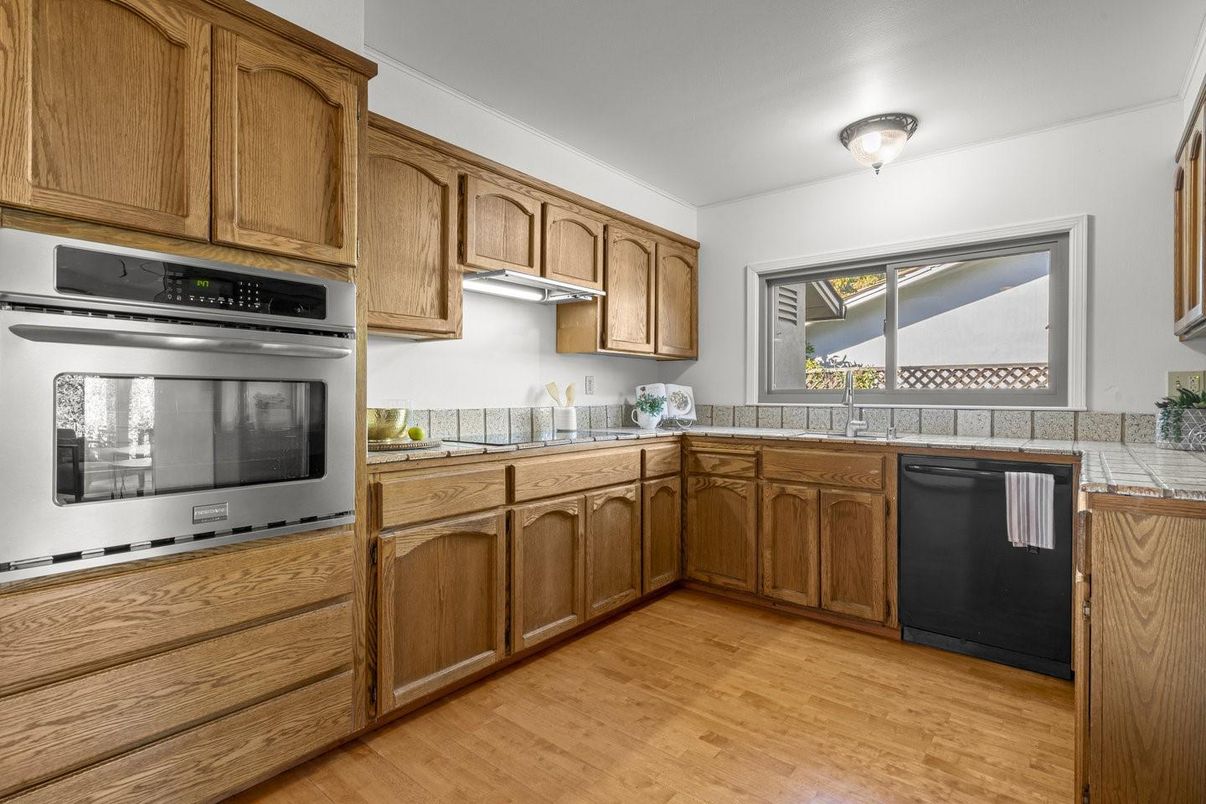 Interior, Kitchen, Tile Countertops, Wood Texture Flooring