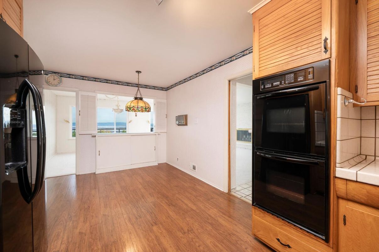 Interior, Kitchen, Pendant Lights, Tile Countertops, Wood Texture Flooring