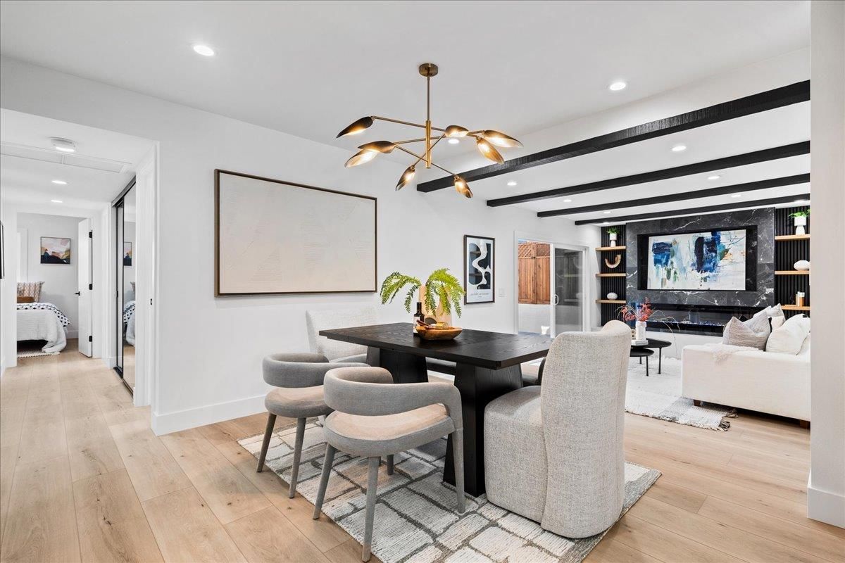 Dining room, Fireplace, Interior, Living room, Pendant Lights, Recessed Lighting, Wood Texture Flooring