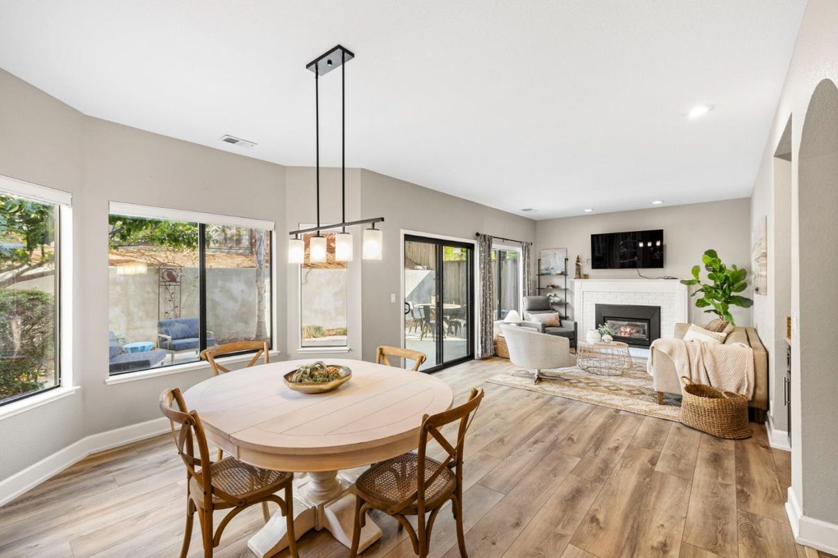 Dining room, Fireplace, Interior, Living room, Pendant Lights, Recessed Lighting, Wood Texture Flooring