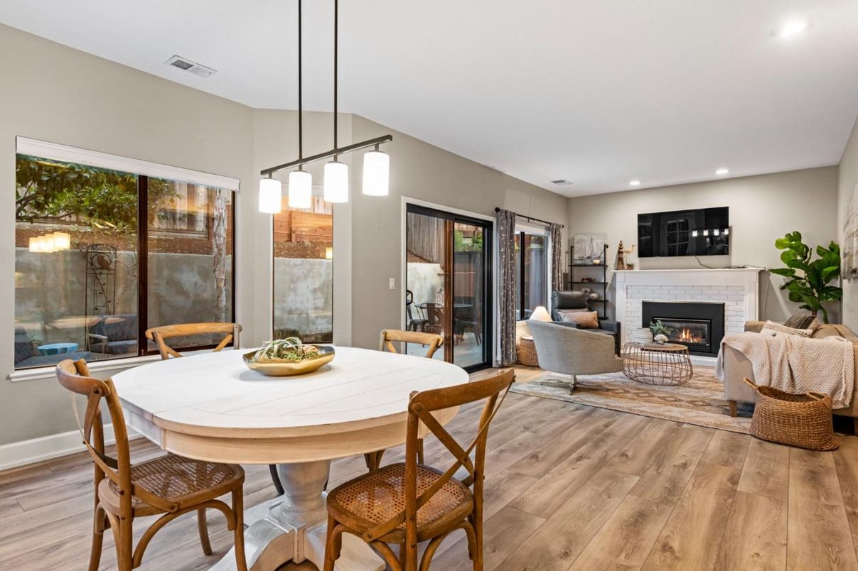 Dining room, Fireplace, Interior, Living room, Pendant Lights, Recessed Lighting, Wood Texture Flooring