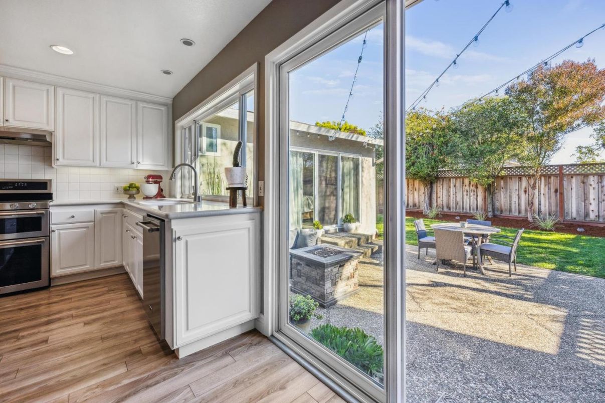 Dining room, Interior, Kitchen, Recessed Lighting, Stainless Steel Appliances, Wood Texture Flooring