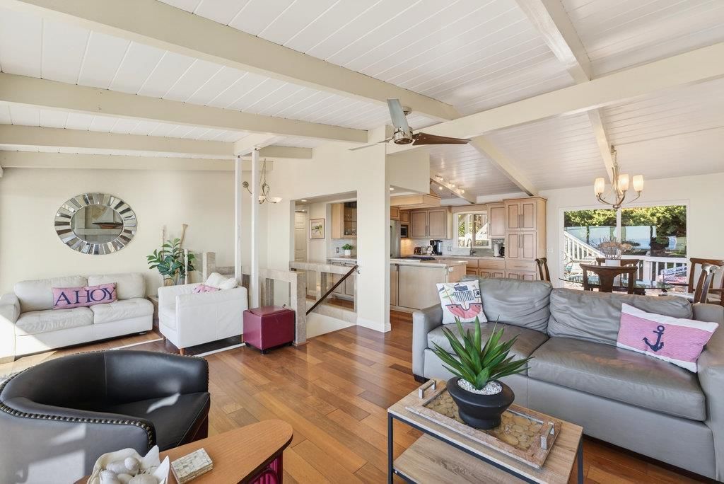 Chandelier, Dining room, Interior, Kitchen, Living room, Stainless Steel Appliances, Wood Texture Flooring