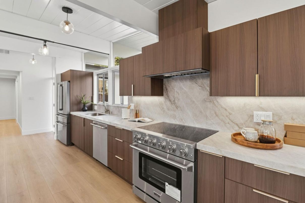 Interior, Kitchen, Marble Walls, Pendant Lights, Stainless Steel Appliances, Wood Texture Flooring